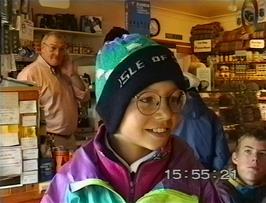 Tristan Wooller decides on a new hat in the Pipers Moon cafe at Luib, Isle of Skye